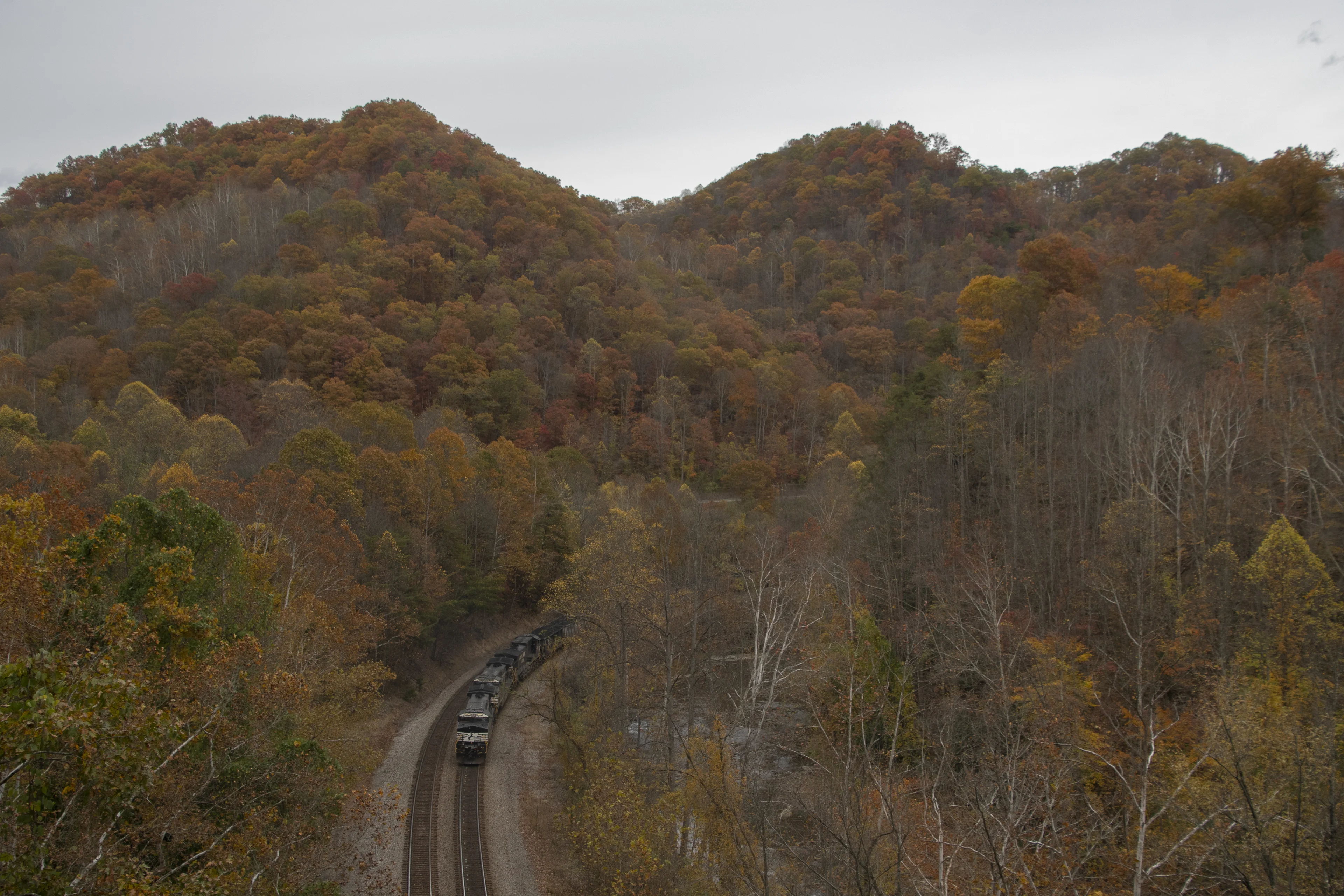 The helpers of an eastbound coal shoving hard around the curve at this location